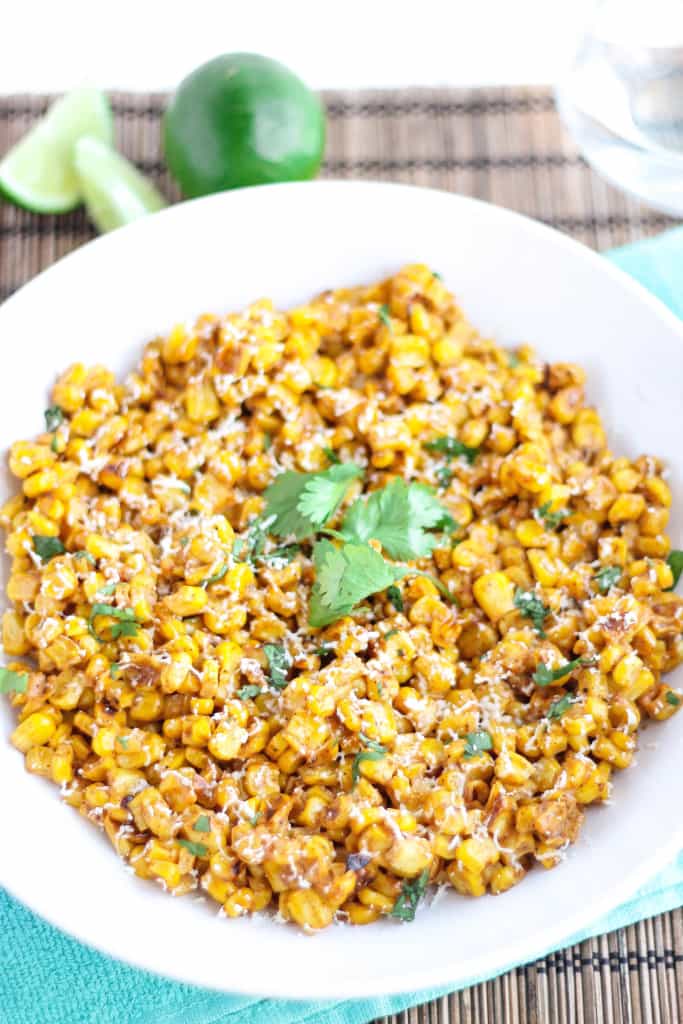Sweet, creamy, cheesy and a little bit spicy, this Mexican street corn salad is the perfect side addition to any dinner, picnic or summertime cookout. Serve with grilled steak, chicken, fish and an ice cold refreshing Mexican beer and you’ve got yourself a fiesta!