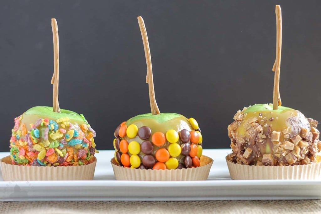 These Caramel Apples are a cinch to make and even better can be personalized to suit everyone in your family! Whether fruity, sweet and salty, peanut butter or toffee is your pleasure, these caramel apples will please any taste bud! They're easier than you think and will have you wondering why you've purchased the store bought kind all these years! | Strawberry Blondie Kitchen