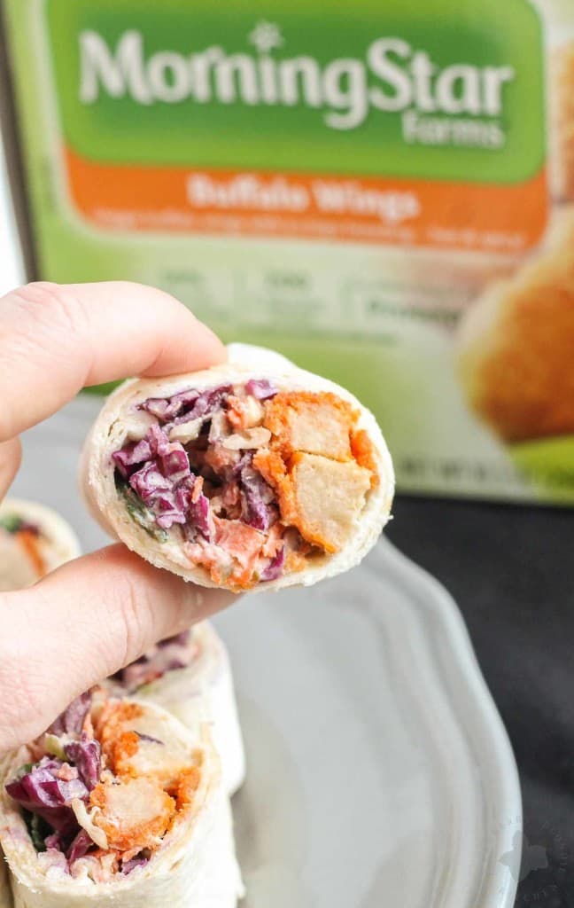 All your favorite flavors of a buffalo wing rolled up into one delicious, snack sized bite in these Buffalo Wing Pinwheels. Made with MorningStar Farms® Buffalo Wings and a blue cheese coleslaw, these are sure to be an all around favorite at your next get together! | Strawberry Blondie Kitchen