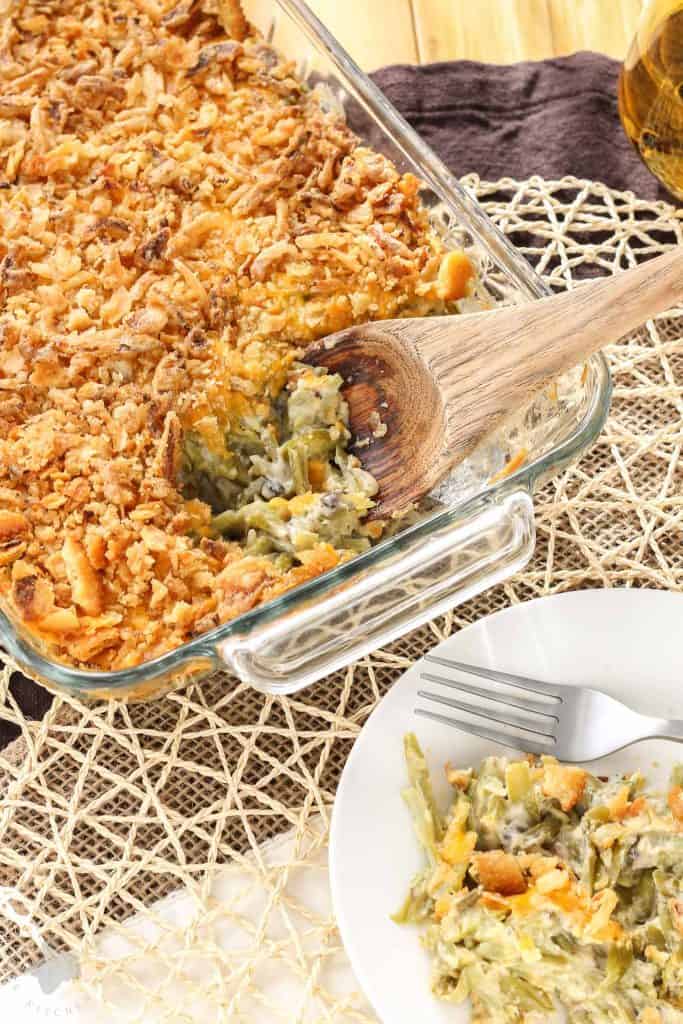 Skip the can of soup this year and make The Best Green Bean Casserole, from scratch.  This version is packed with flavor from the made from scratch fresh mushroom soup, french style green beans, cheddar cheese and french fried onions.  You'll never go back to the can of soup again! | Strawberry Blondie Kitchen