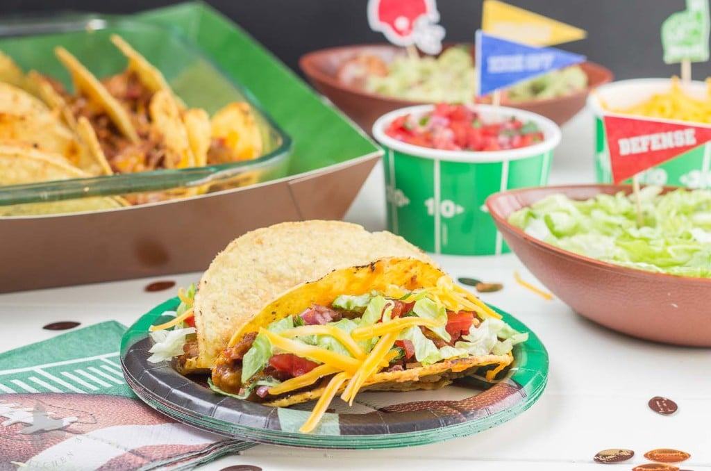 Easy and delicious Healthier Oven Baked Tacos are super simple to make, feed a crowd and use ingredients that you can already find in your pantry. Perfect for watching the BIG GAME and feeding the hungry football fans! | Strawberry Blondie Kitchen