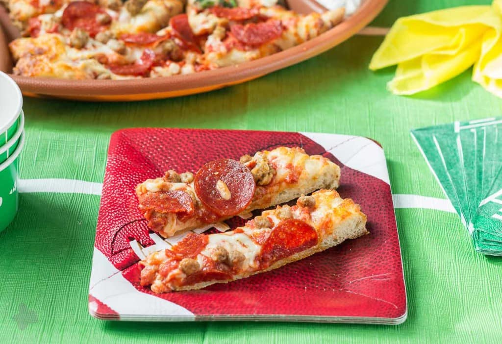 Make the right call during the BIG game this year and tailgate at home. It's simple, easy and stress free which will leave you sitting down just in time to enjoy the game. Serve DIGIORNO® pizza, cut into strips with homemade dipping sauce on the sides. Sure to be a crowd pleaser and having you scoring a TOUCHDOWN! | Strawberry Blondie Kitchen