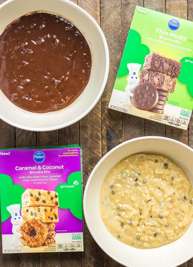 These Pillsbury Pillsbury Girl Scouts Baking Mixes feature the flavor of Samoas in their Caramel and Coconut Blondies and Thin Mint Cookies in their Thin Mint Brownies. All I can say is, Pillsbury nailed it. Now you can enjoy the flavor of Girl Scout cookies all year long! | Strawberry Blondie Kitchen