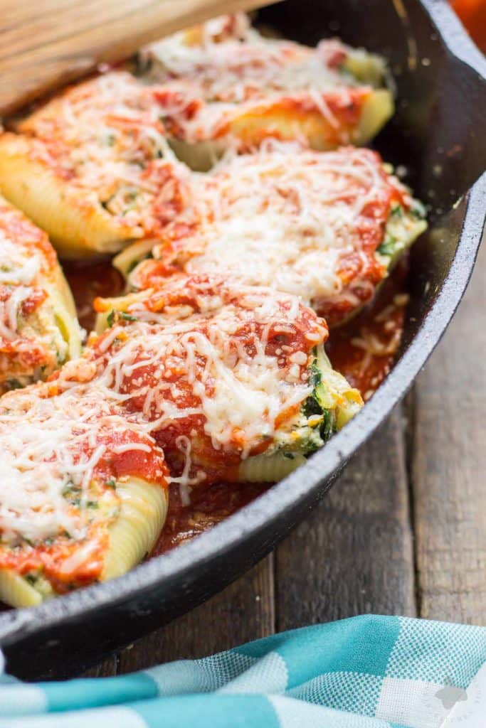 These veggie stuffed shells are packed with hearty vegetables, creamy cheese and smothered in delicious garlic Ragu Homestyle Pasta Sauce. They're so good, even the meat eaters will be asking for seconds! | Strawberry Blondie Kitchen