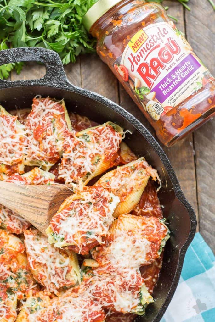 These veggie stuffed shells are packed with hearty vegetables, creamy cheese and smothered in delicious garlic Ragu Homestyle Pasta Sauce. They're so good, even the meat eaters will be asking for seconds! | Strawberry Blondie Kitchen