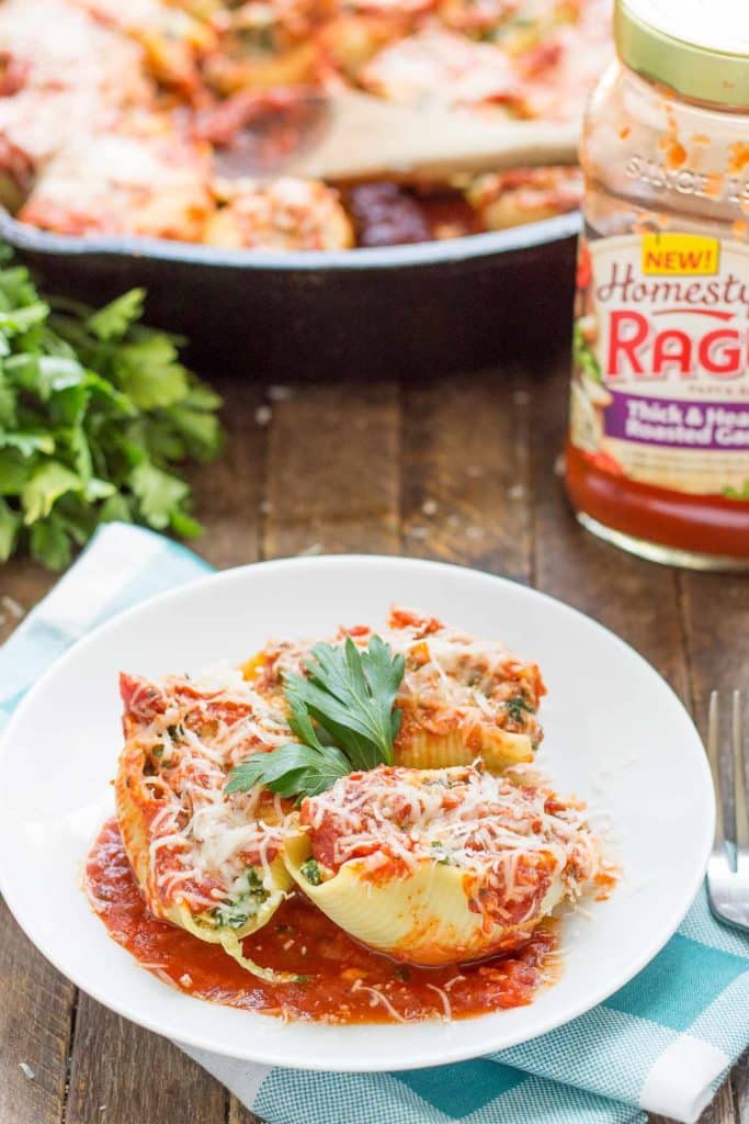 These veggie stuffed shells are packed with hearty vegetables, creamy cheese and smothered in delicious garlic Ragu Homestyle Pasta Sauce. They're so good, even the meat eaters will be asking for seconds! | Strawberry Blondie Kitchen