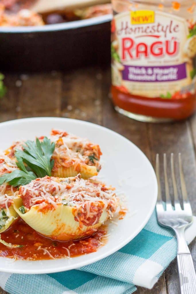 These veggie stuffed shells are packed with hearty vegetables, creamy cheese and smothered in delicious garlic Ragu Homestyle Pasta Sauce. They're so good, even the meat eaters will be asking for seconds! | Strawberry Blondie Kitchen