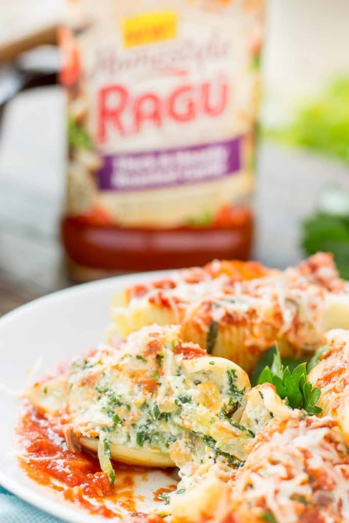 These veggie stuffed shells are packed with hearty vegetables, creamy cheese and smothered in delicious garlic Ragu Homestyle Pasta Sauce. They're so good, even the meat eaters will be asking for seconds! | Strawberry Blondie Kitchen