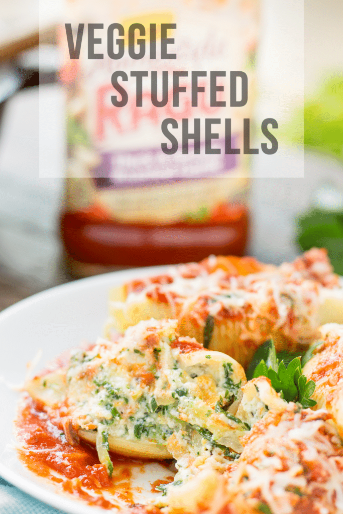 These veggie stuffed shells are packed with hearty vegetables, creamy cheese and smothered in delicious garlic Ragu Homestyle Pasta Sauce. They're so good, even the meat eaters will be asking for seconds! | Strawberry Blondie Kitchen