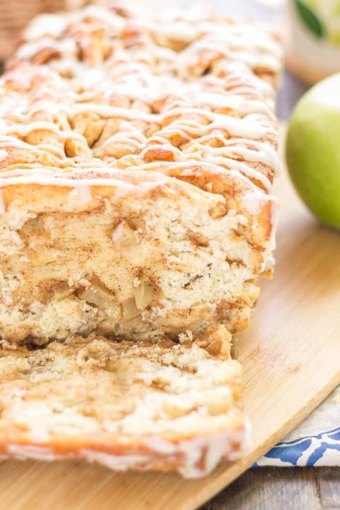 Apple Pie Pull Apart Bread is filled with chopped apples, cinnamon, brown sugar and drizzled with a cream cheese glaze. Sure to give Apple Pie a run for its money! | Strawberry Blondie Kitchen