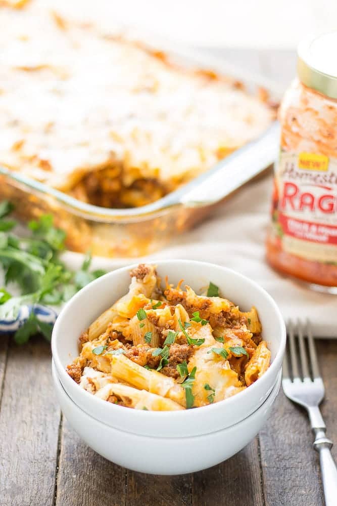 Baked Mostaccioli is loaded with ooey, gooey cheeses and packed with meat thanks to RAGÚ® Homestyle Thick & Hearty Meat Sauce. It's the perfect comfort food any night of the week and sure to become a family favorite! | Strawberry Blondie Kitchen