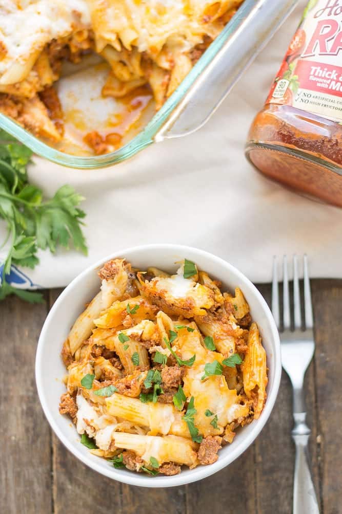 Baked Mostaccioli is loaded with ooey, gooey cheeses and packed with meat thanks to RAGÚ® Homestyle Thick & Hearty Meat Sauce. It's the perfect comfort food any night of the week and sure to become a family favorite! | Strawberry Blondie Kitchen