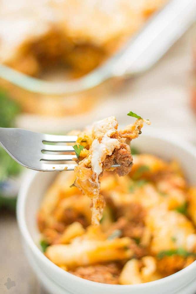 Baked Mostaccioli is loaded with ooey, gooey cheeses and packed with meat thanks to RAGÚ® Homestyle Thick & Hearty Meat Sauce. It's the perfect comfort food any night of the week and sure to become a family favorite! | Strawberry Blondie Kitchen