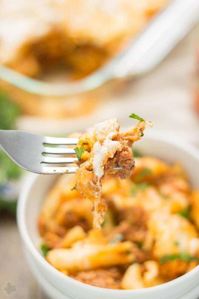 Baked Mostaccioli is loaded with ooey, gooey cheeses and packed with meat thanks to RAGÚ® Homestyle Thick & Hearty Meat Sauce. It's the perfect comfort food any night of the week and sure to become a family favorite! | Strawberry Blondie Kitchen