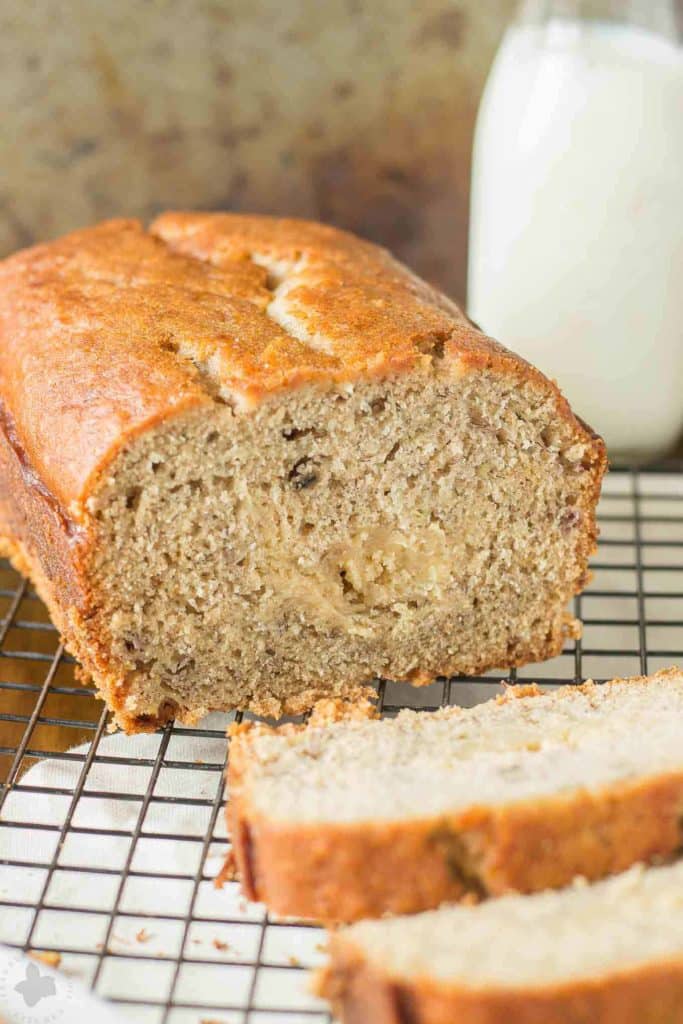 Super moist banana bread is ribboned with brown sugar cream cheese and aromatic spices making this Brown Sugar Stuffed Banana Bread one outstanding quick bread. It's sure to be the last Banana bread recipe you'll ever need! | Strawberry Blondie Kitchen