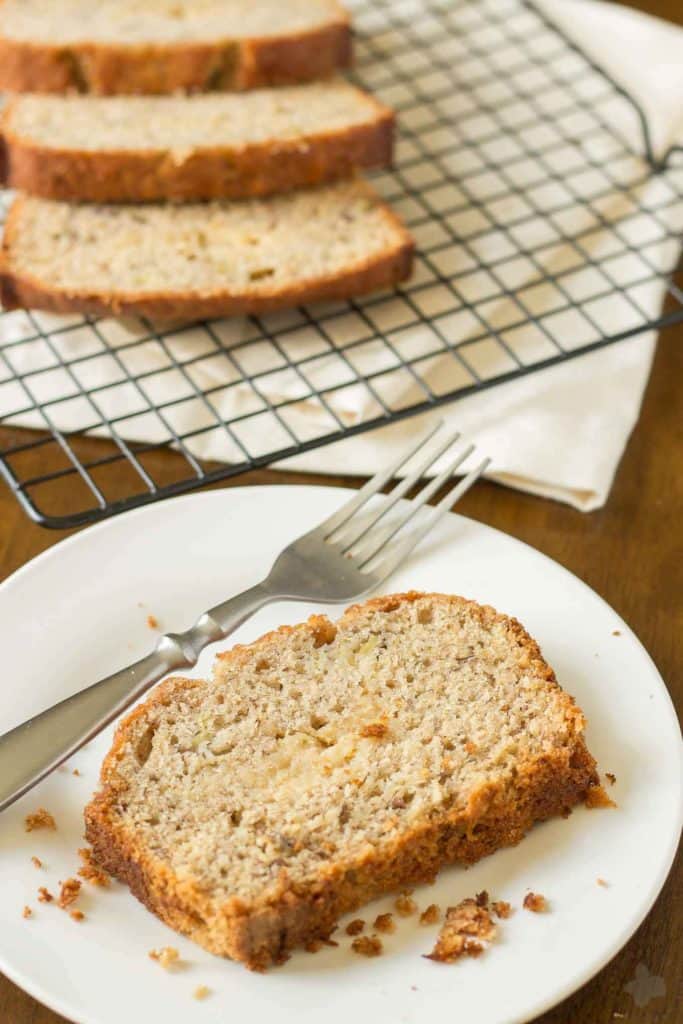 Super moist banana bread is ribboned with brown sugar cream cheese and aromatic spices making this Brown Sugar Stuffed Banana Bread one outstanding quick bread. It's sure to be the last Banana bread recipe you'll ever need! | Strawberry Blondie Kitchen