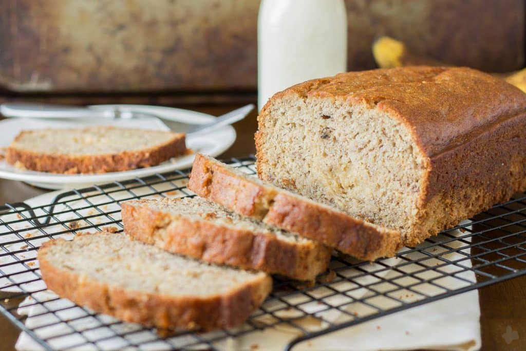 Super moist banana bread is ribboned with brown sugar cream cheese and aromatic spices making this Brown Sugar Stuffed Banana Bread one outstanding quick bread. It's sure to be the last Banana bread recipe you'll ever need! | Strawberry Blondie Kitchen