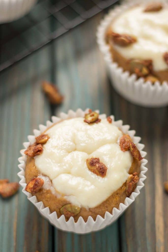 Pumpkin Spice Cream Cheese Muffins are the quintessential treat of Fall. Filled with aromatic autumn spices, stuffed with cream cheese and sprinkled with sugared pepitas, this is sure to be your go to Pumpkin Spice Cream Cheese Muffins recipe. | Strawberry Blondie Kitchen