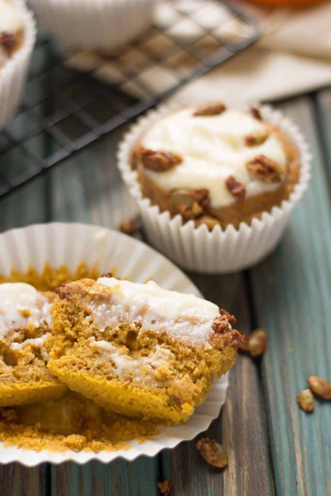 Pumpkin Spice Cream Cheese Muffins are the quintessential treat of Fall. Filled with aromatic autumn spices, stuffed with cream cheese and sprinkled with sugared pepitas, this is sure to be your go to Pumpkin Spice Cream Cheese Muffins recipe. | Strawberry Blondie Kitchen