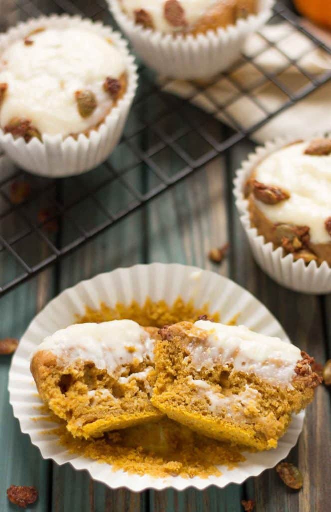 Pumpkin Spice Cream Cheese Muffins are the quintessential treat of Fall. Filled with aromatic autumn spices, stuffed with cream cheese and sprinkled with sugared pepitas, this is sure to be your go to Pumpkin Spice Cream Cheese Muffins recipe. | Strawberry Blondie Kitchen