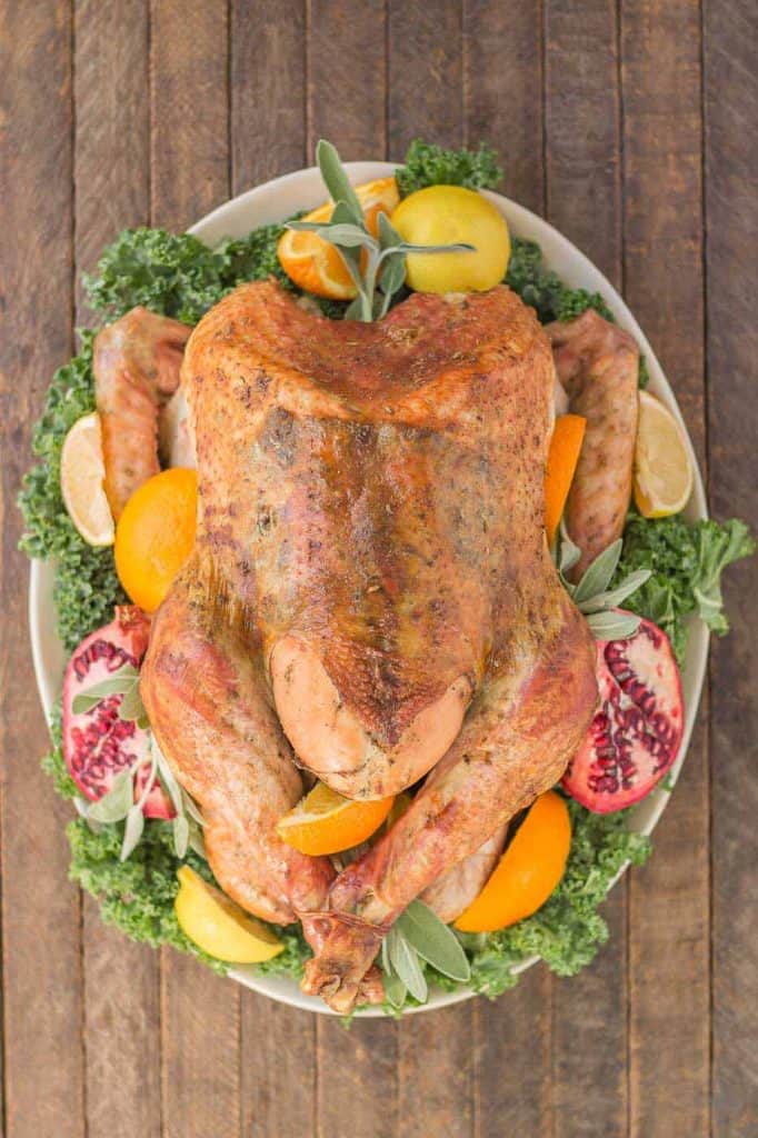 Juicy, moist and super flavorful, this Herb Roasted Turkey should be at the center of your Thanksgiving table! | Strawberry Blondie Kitchen