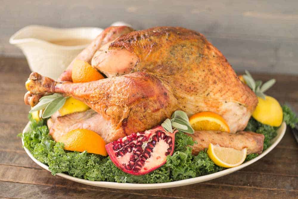 Juicy, moist and super flavorful, this Herb Roasted Turkey should be at the center of your Thanksgiving table! | Strawberry Blondie Kitchen