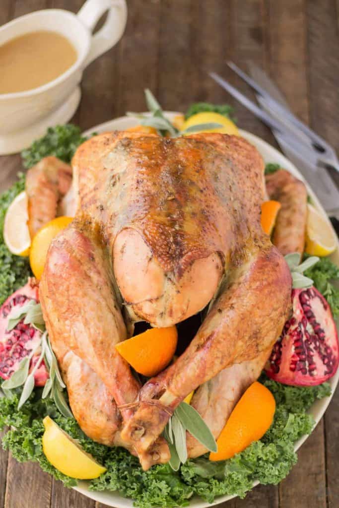 Juicy, moist and super flavorful, this Herb Roasted Turkey should be at the center of your Thanksgiving table! | Strawberry Blondie Kitchen