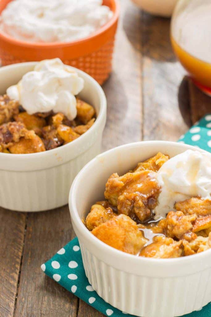 Warm and toasty, this Pumpkin Bread Pudding with Brown Sugar Sauce is pure bliss and then taken to another level with sweet brown sugar {whiskey} sauce! | Strawberry Blondie Kitchen