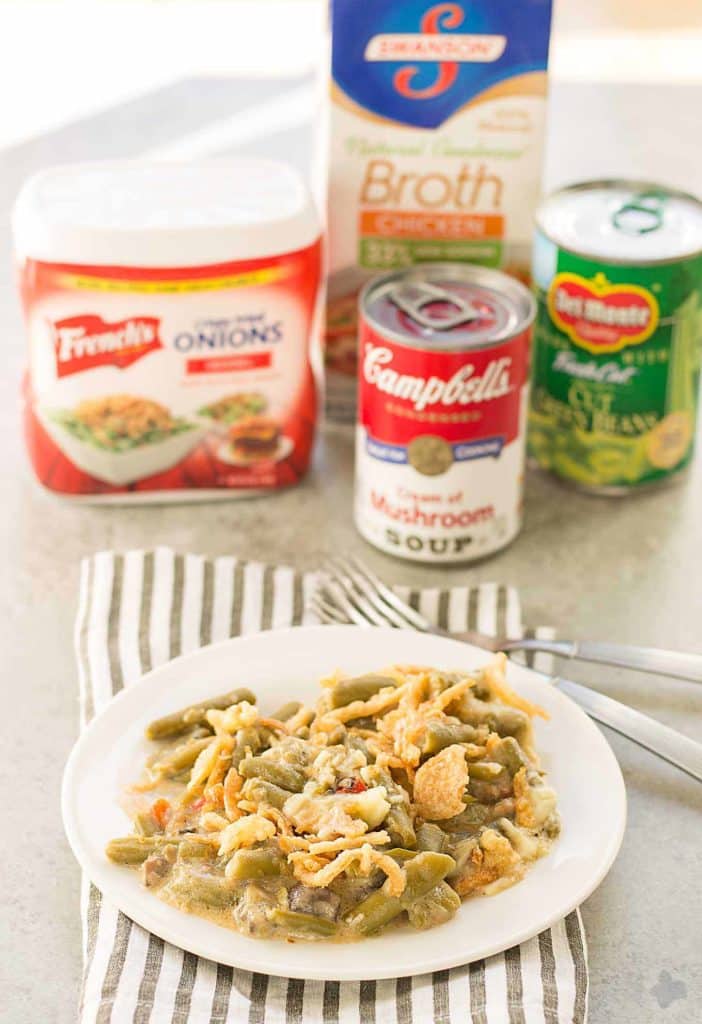 Sharp white cheddar cheese elevates this Slow Cooker White Cheddar Green Bean Casserole to make it the star side dish of your holiday table! | Strawberry Blondie Kitchen