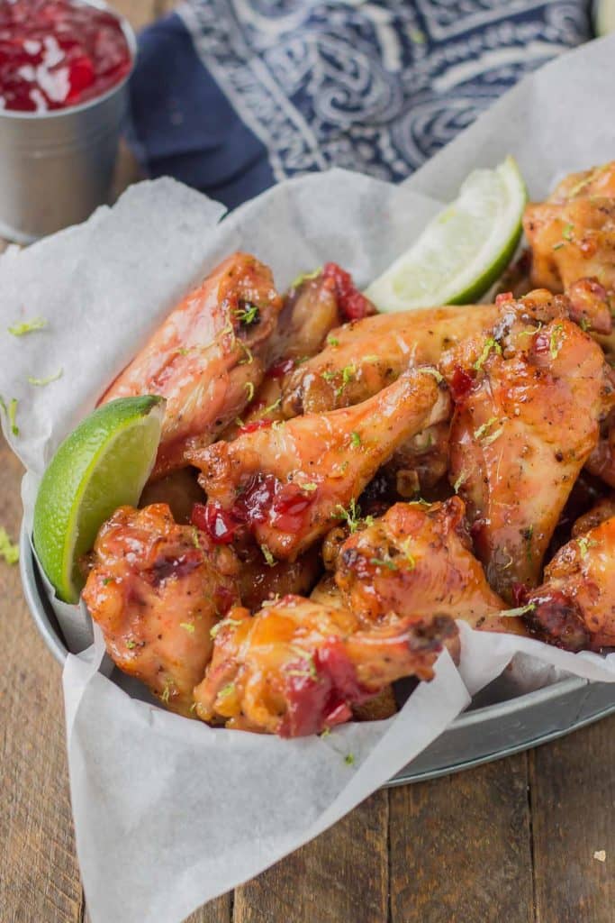 Sweet, tart and tangy, these Cherry Lime Baked Wings are delicious and addictive. Be sure to make a big batch, they're sure to be the hit of your next game day party! | Strawberry Blondie Kitchen