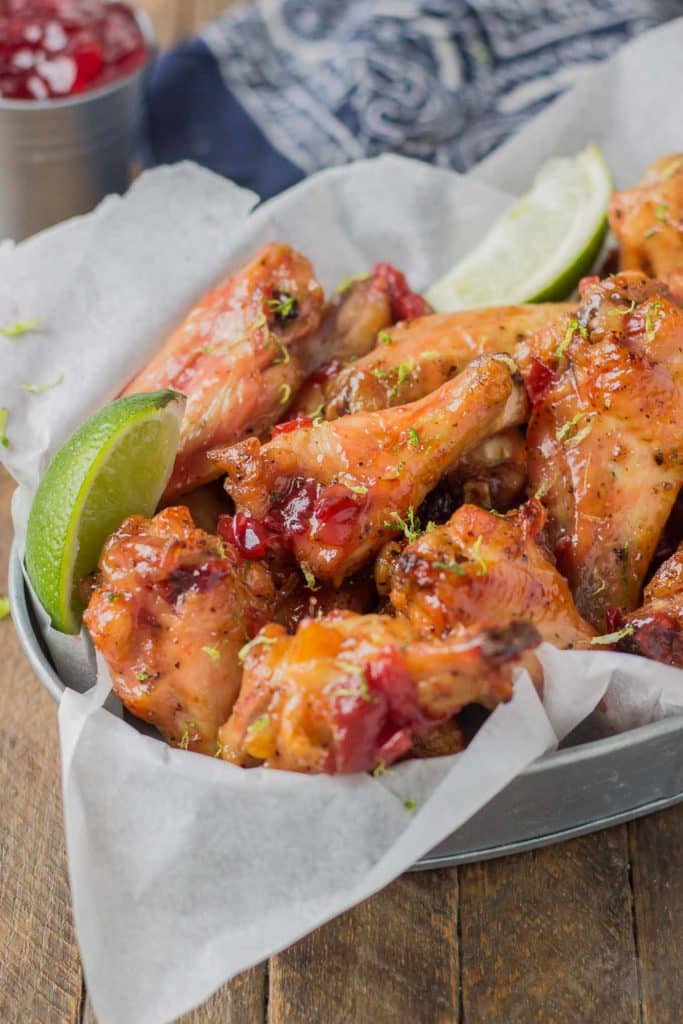 Sweet, tart and tangy, these Cherry Lime Baked Wings are delicious and addictive. Be sure to make a big batch, they're sure to be the hit of your next game day party! | Strawberry Blondie Kitchen