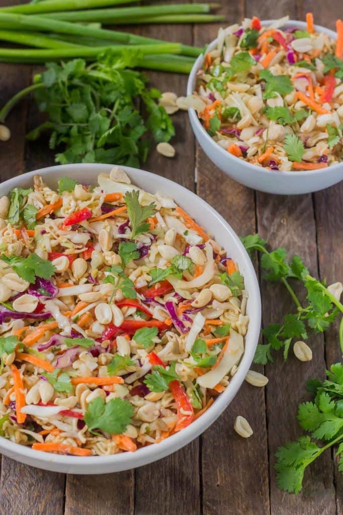 Simple and delicious, this Asian Sesame Noodle Slaw comes together quickly with a little help from P.F. Chang's Sesame sauce for you to be side dish ready in 5 minutes! | Strawberry Blondie Kitchen