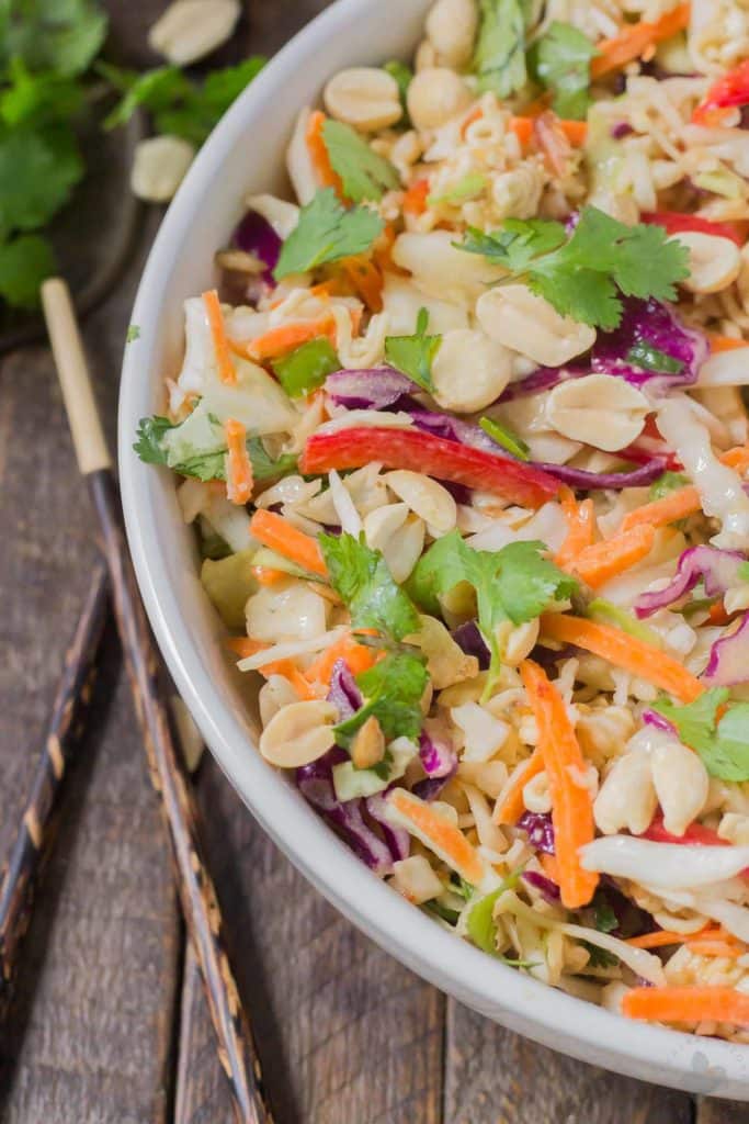 Simple and delicious, this Asian Sesame Noodle Slaw comes together quickly with a little help from P.F. Chang's Sesame sauce for you to be side dish ready in 5 minutes! | Strawberry Blondie Kitchen