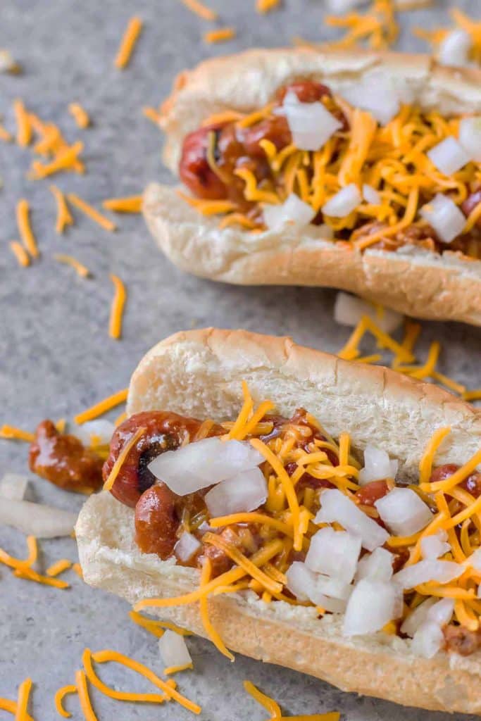 There is something about a hot dog smothered in chili and topped with cheese that has us yearning for the “good ole days.” Take a stroll back to childhood with this Easy Chili Dog. | Strawberry Blondie Kitchen