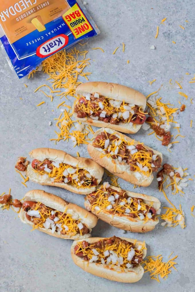 There is something about a hot dog smothered in chili and topped with cheese that has us yearning for the “good ole days.” Take a stroll back to childhood with this Easy Chili Dog. | Strawberry Blondie Kitchen