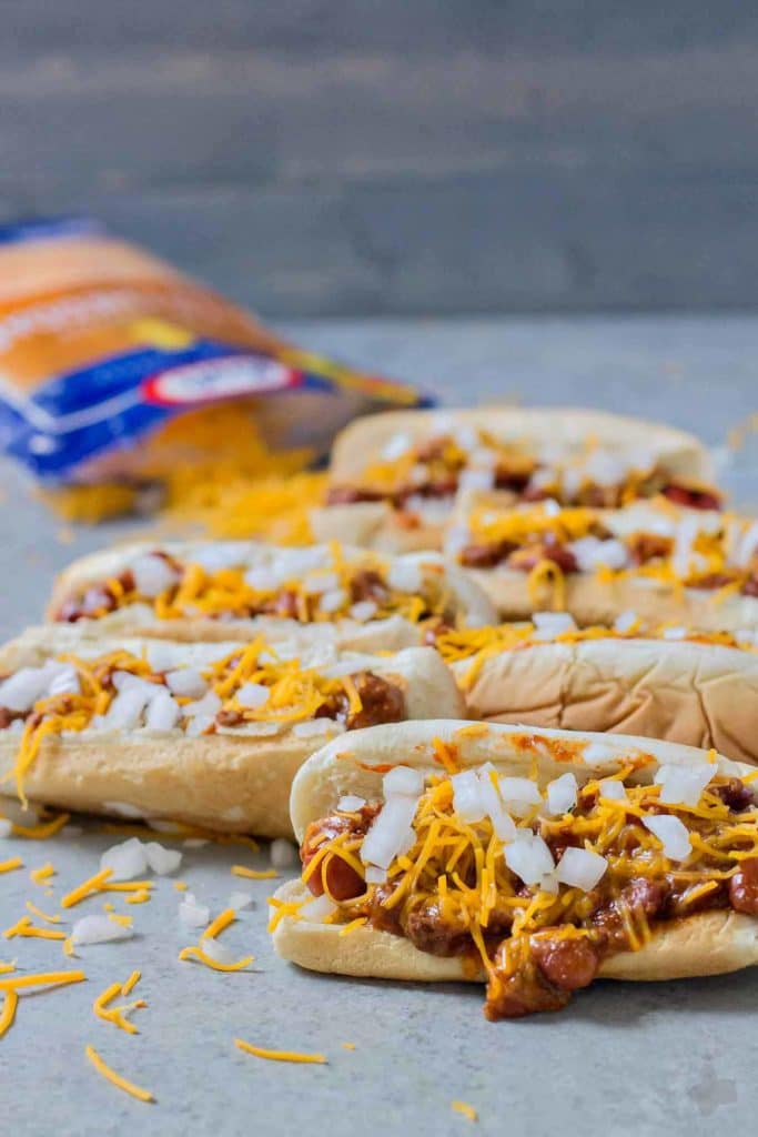 There is something about a hot dog smothered in chili and topped with cheese that has us yearning for the “good ole days.” Take a stroll back to childhood with this Easy Chili Dog. | Strawberry Blondie Kitchen