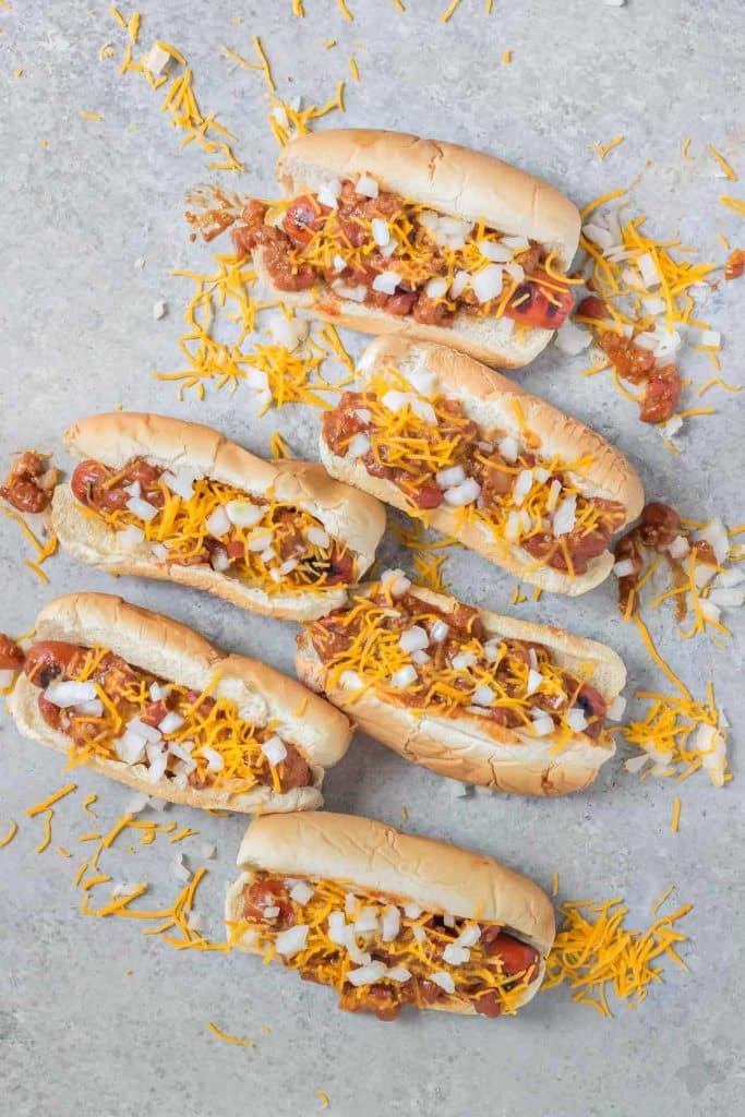 There is something about a hot dog smothered in chili and topped with cheese that has us yearning for the “good ole days.” Take a stroll back to childhood with this Easy Chili Dog. | Strawberry Blondie Kitchen