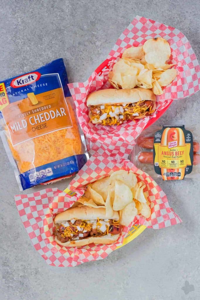 There is something about a hot dog smothered in chili and topped with cheese that has us yearning for the “good ole days.” Take a stroll back to childhood with this Easy Chili Dog. | Strawberry Blondie Kitchen