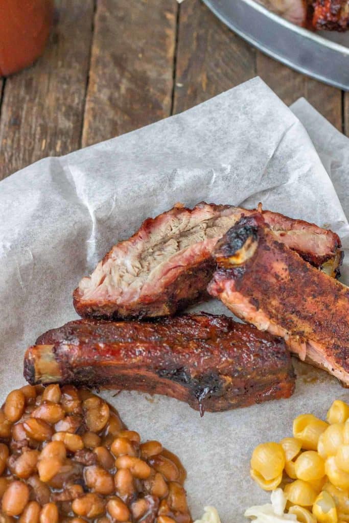 Sweet and Smoky, these Dry Rubbed Pork Ribs are extra tender and juicy thanks to Smithfield Extra Tender Pork Back Ribs. One lookand you'll be running to the grill to make your own! | Strawberry Blondie Kitchen