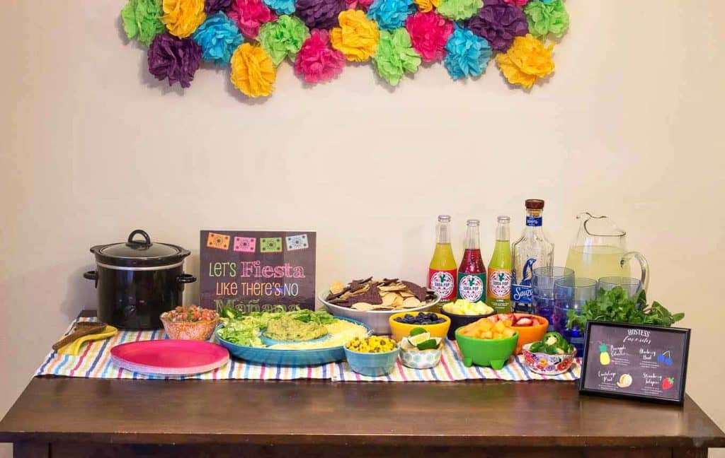 Throwing a fiesta couldn’t be easier with these simple pitcher style margaritas, a make your own margarita bar and a fun tablescape. Just grab a few friends and you’ve got a party! Strawberry Blondie Kitchen