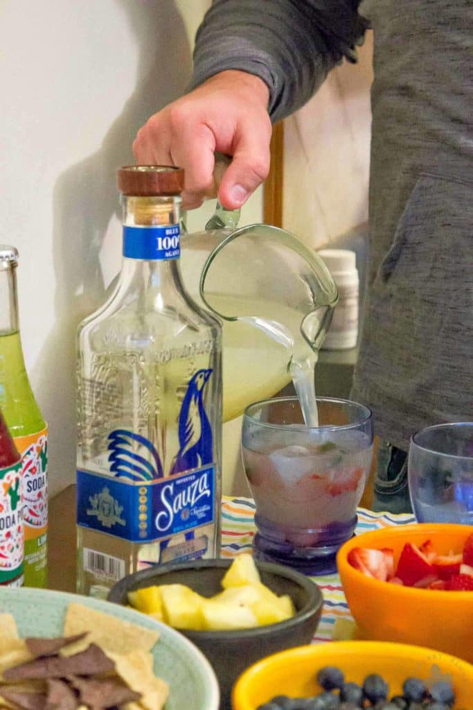 Throwing a fiesta couldn’t be easier with these simple pitcher style margaritas, a make your own margarita bar and a fun tablescape. Just grab a few friends and you’ve got a party! Strawberry Blondie Kitchen