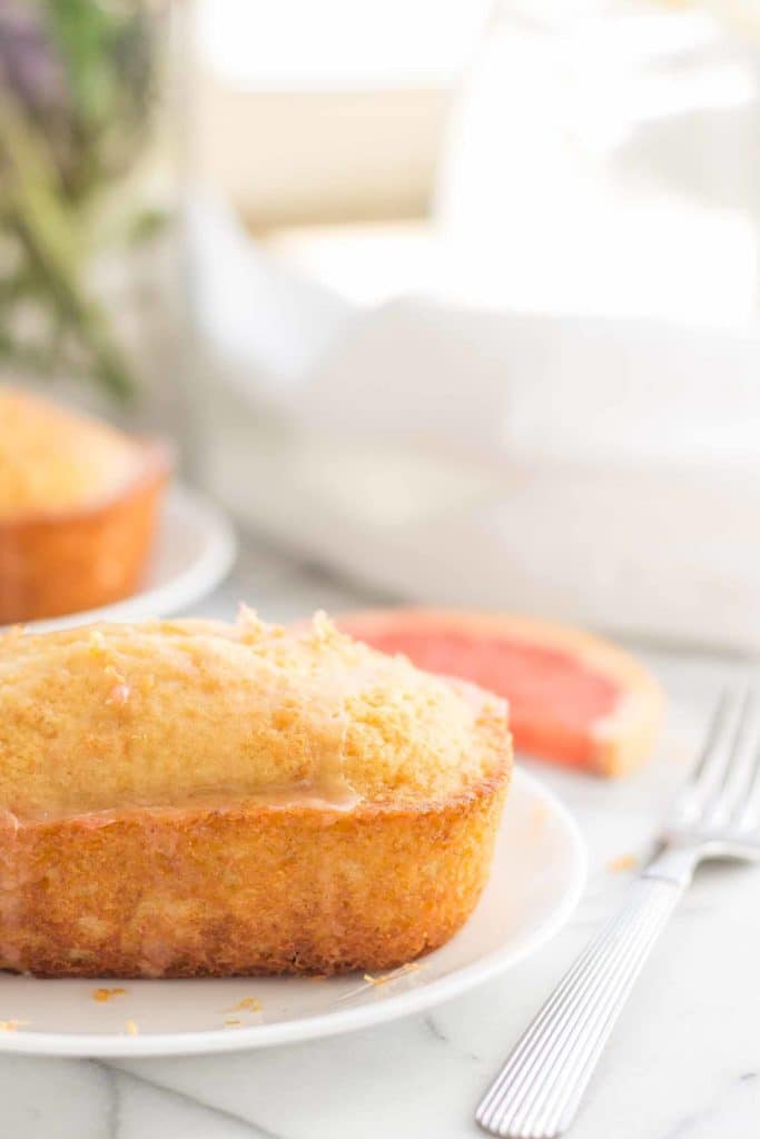 Deliciously moist and bursting with fresh grapefruit flavor, these Grapefruit Olive Oil Mini Cakes are cute, delectable and delightful making them perfect for any occasion! Strawberry Blondie Kitchen