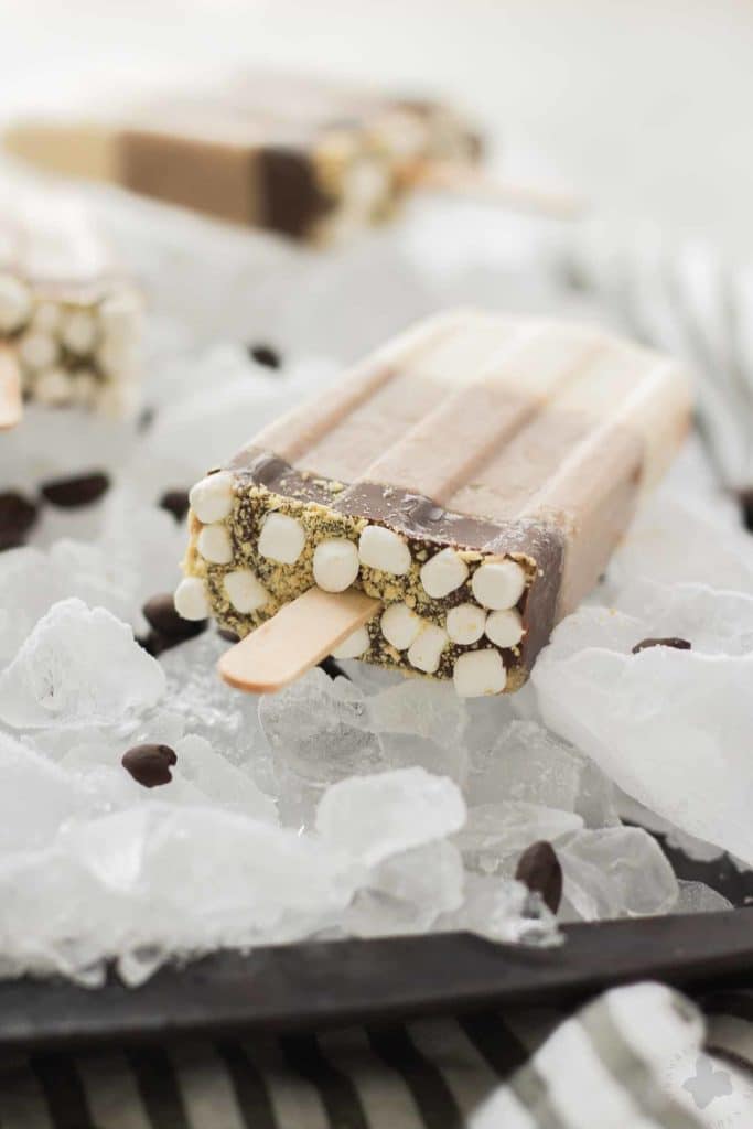 All the flavors you love of s'mores and coffee combined to give you one deliciously cool, refreshing and caffeine spiked popsicle. | Strawberry Blondie Kitchen