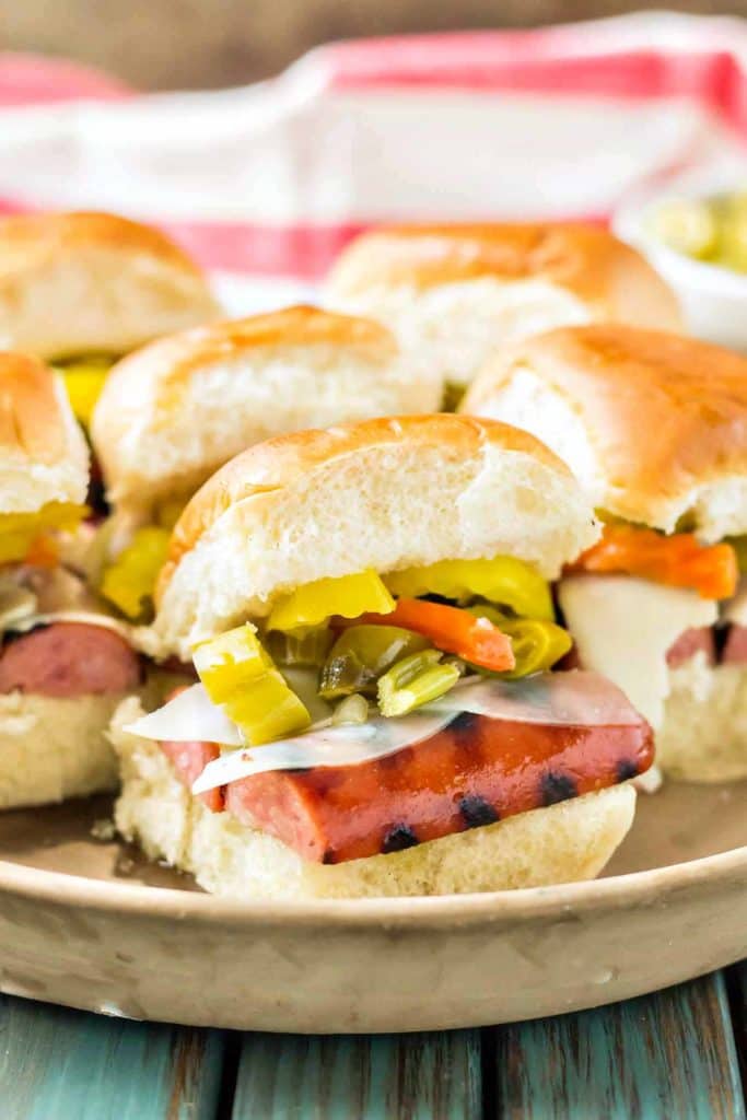Chicago Style Italian Smoked Sausage Sliders feature Eckrich Smoked Sausage, provolone and giardiniera on a slider roll.  A twist on the classic sandwich, you'll love this bite sized version even more! | Strawberry Blondie Kitchen