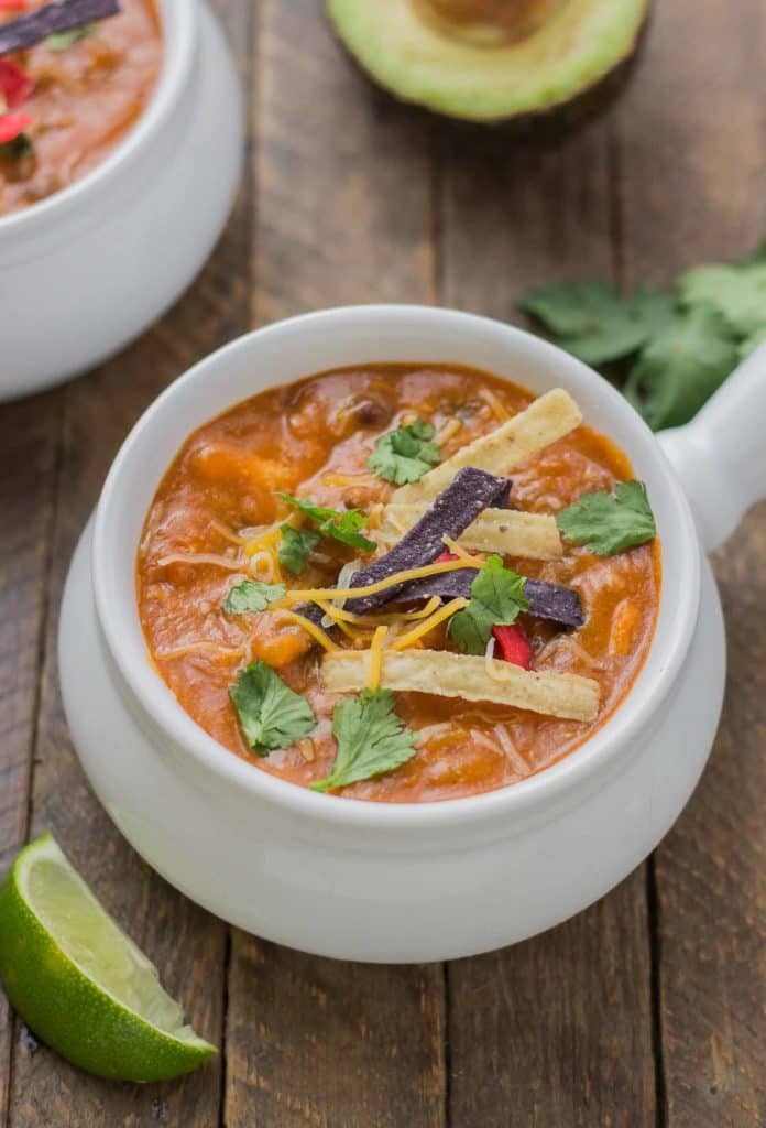 Start your back to school shopping this year at Walmart and make this delicious Chicken Enchilada Soup. On the table in less than 30 minutes! | Strawberry Blondie Kitchen