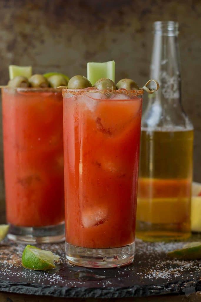 Smoky spices, liquid smoke and Clamato juice blend perfectly to create these Smokin’ Micheladas which are the ultimate brunch sippers. | Strawberry Blondie Kitchen