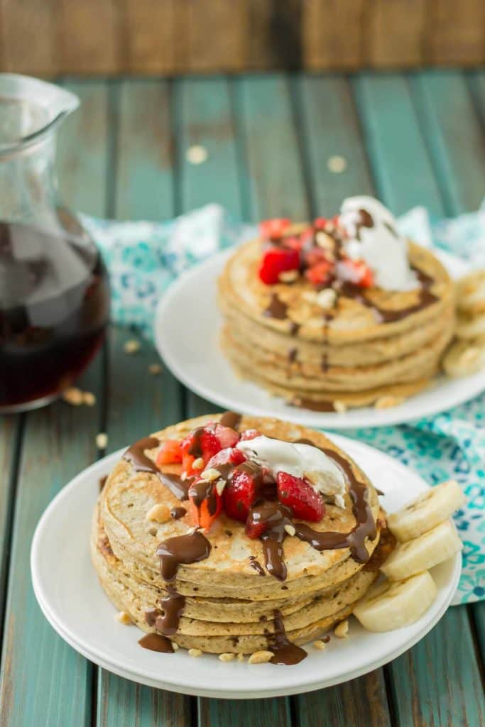 Now you can have an ice cream sundae for breakfast.  Banana Split Pancakes have all the flavors you love of the classic ice cream treat, in breakfast form! | Strawberry Blondie Kitchen