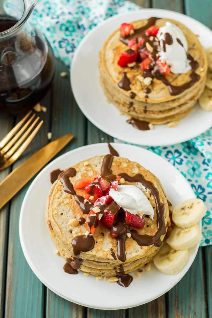 Now you can have an ice cream sundae for breakfast.  Banana Split Pancakes have all the flavors you love of the classic ice cream treat, in breakfast form! | Strawberry Blondie Kitchen