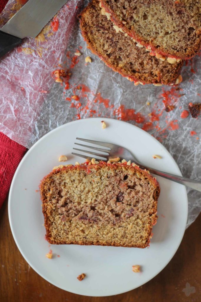 Peanut Butter and Jelly Banana Bread is a PB & J lovers dream!  Switch up the jelly to create your ultimate sandwich in a baked bread form. | Strawberry Blondie Kitchen