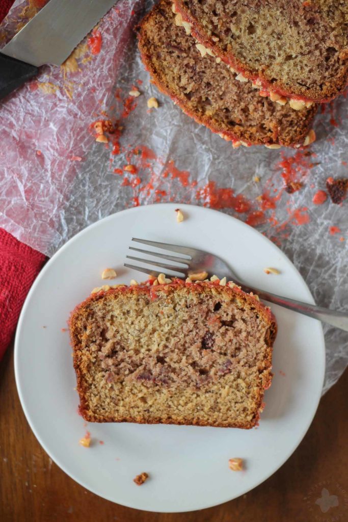 Peanut Butter and Jelly Banana Bread is a PB & J lovers dream!  Switch up the jelly to create your ultimate sandwich in a baked bread form. | Strawberry Blondie Kitchen